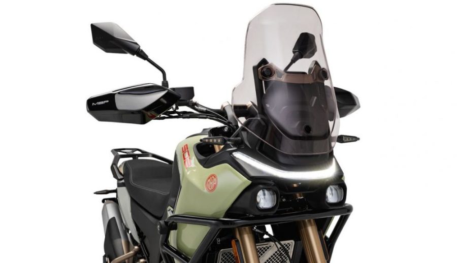 <img src="https://motodinamia.com/wp/wp-content/uploads/2024/01/mbp-t502x-2024-frontal-mdm-2.jpeg" alt="La MBP T502X 2024 posee un estilo aventurero muy personal, pero sin exageraciones, con un toque futurista evidente en el frontal. La iluminación es LED, con dos focos convencionales y una tira en la parte alta de la frontal">