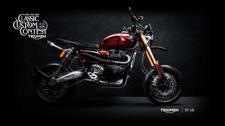 Una Triumph personalizada en un modelo supermoto bordeau con múltiples accesorios a medida