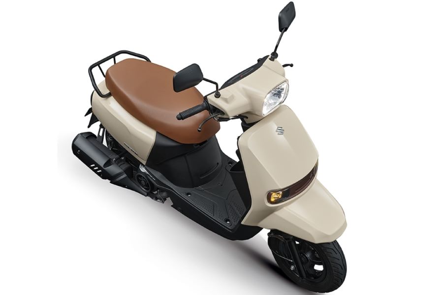 Suzuki Sui 125 color beige con asiento marrón miel. Suzuki Sui 125 color beige con asiento marrón miel.