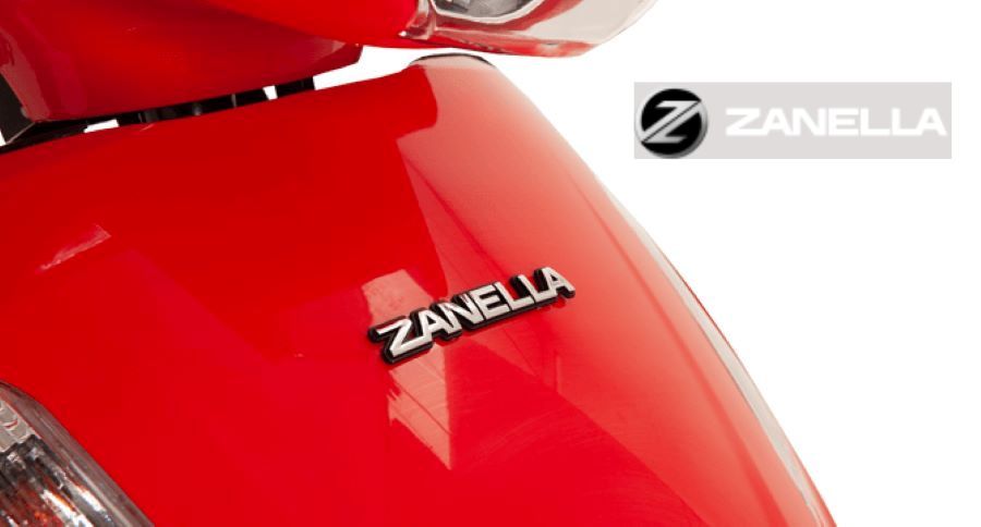 Nueva identidad Zanella 1 Imagen parcial de la parte frontal de un scooter Zanella rojo, donde se ve el nuevo logotipo. A un costado, el istotipo completo.