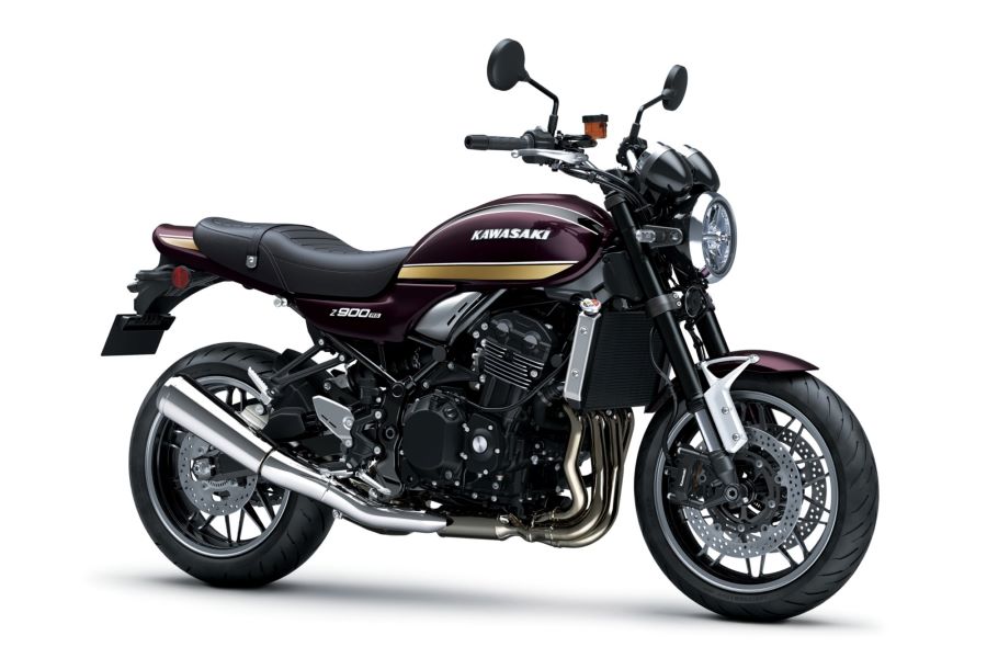 Vista lateral derechas de una Kawasaki z900 RS morada y dorada