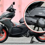 Lateral izquierdo de un scooter Yamaha Aerox Turbo. en círculo, primer plano del sistema YECVT