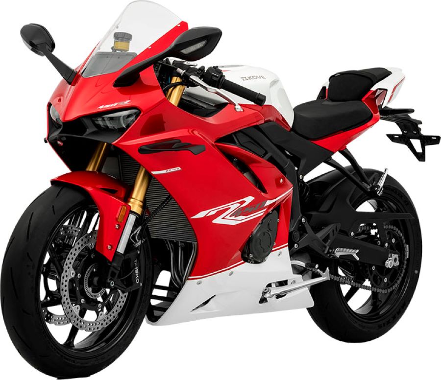 Una moto KOVE 450RR estándar roja y blanca