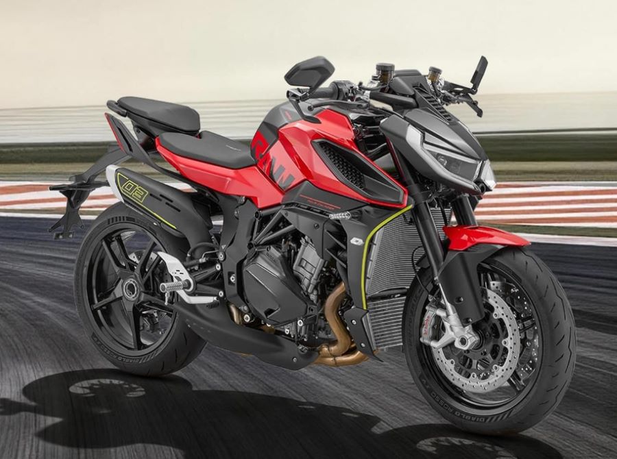 Una moto QJMotor SRK 1051 con una pista de fondo